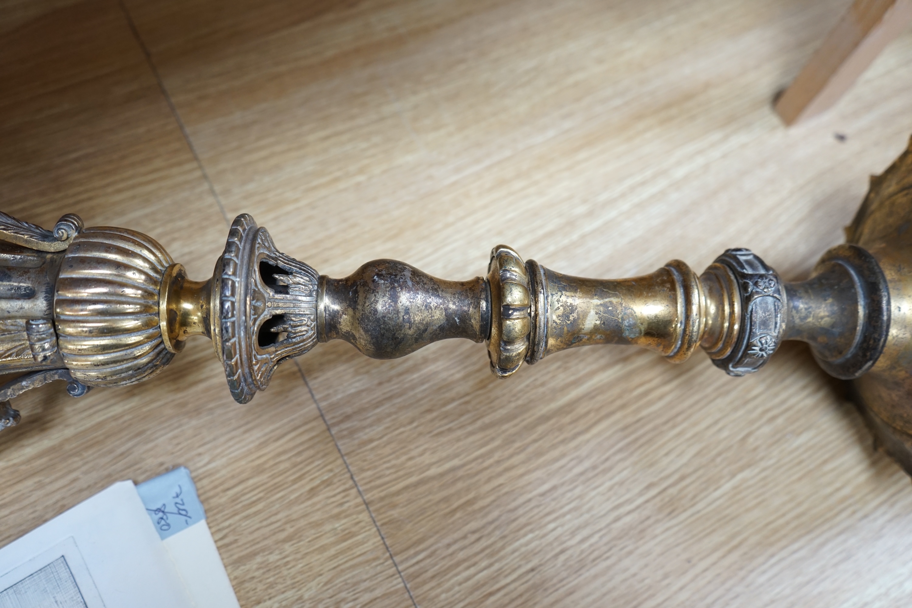 A brass ecclesiastical part chandelier column, 105cm in length. Condition - fair